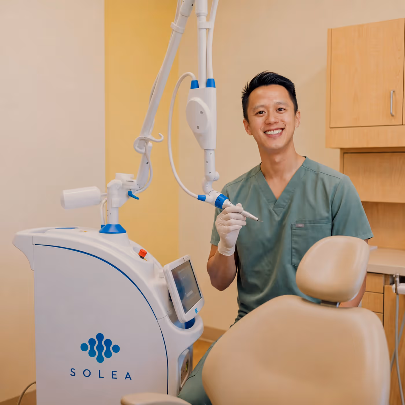 Dr. Dan Truong with the Solea dental laser at Smile Gallery